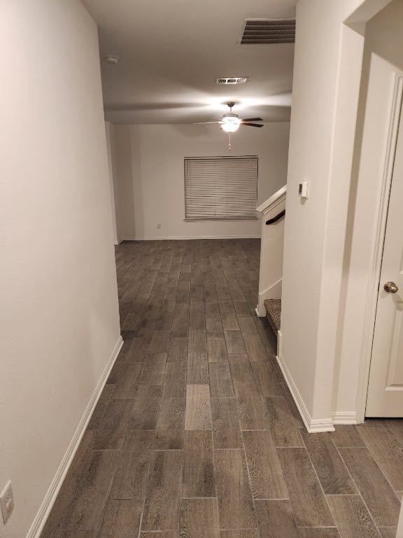18413 Quiet Range Drive Elgin, TX 78621 - Photo 3 of 4 a view of a room with wooden floor