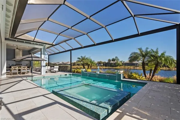 a view of a backyard with sitting area