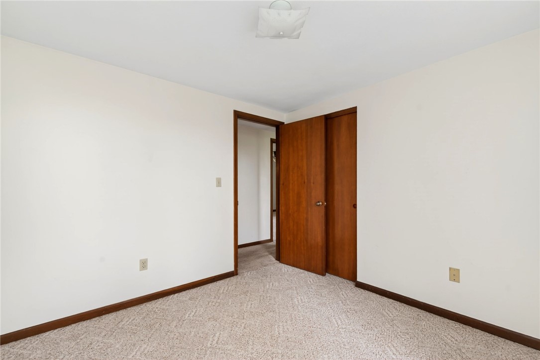 7988 McCool Road Greenville, OH 45331 - Photo 16 of 50 This spacious room offers a versatile layout, ready for personalization and comfort.