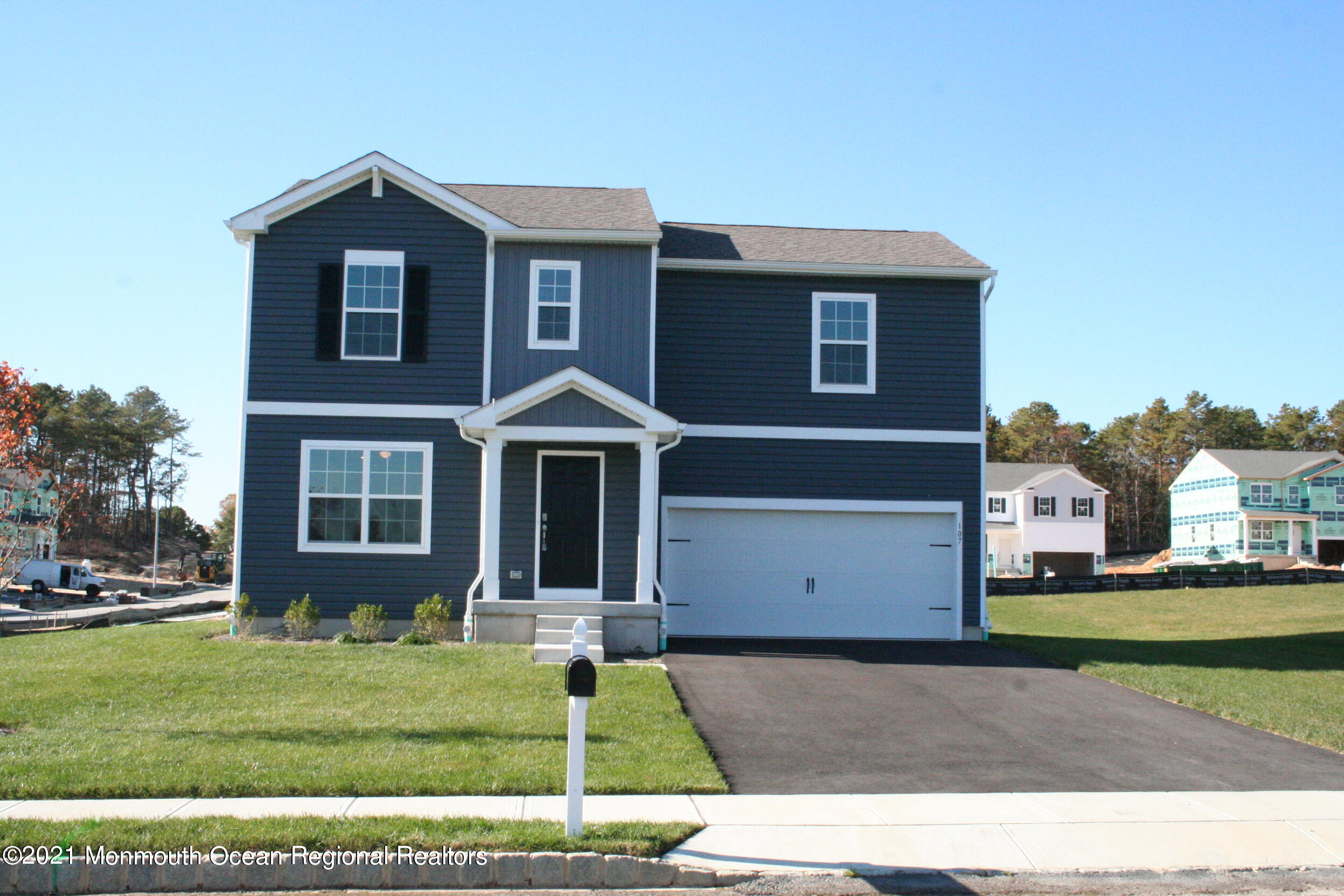 107 Cox Road Barnegat, NJ 08005 - Photo 1 of 44 a front view of a house with a yard