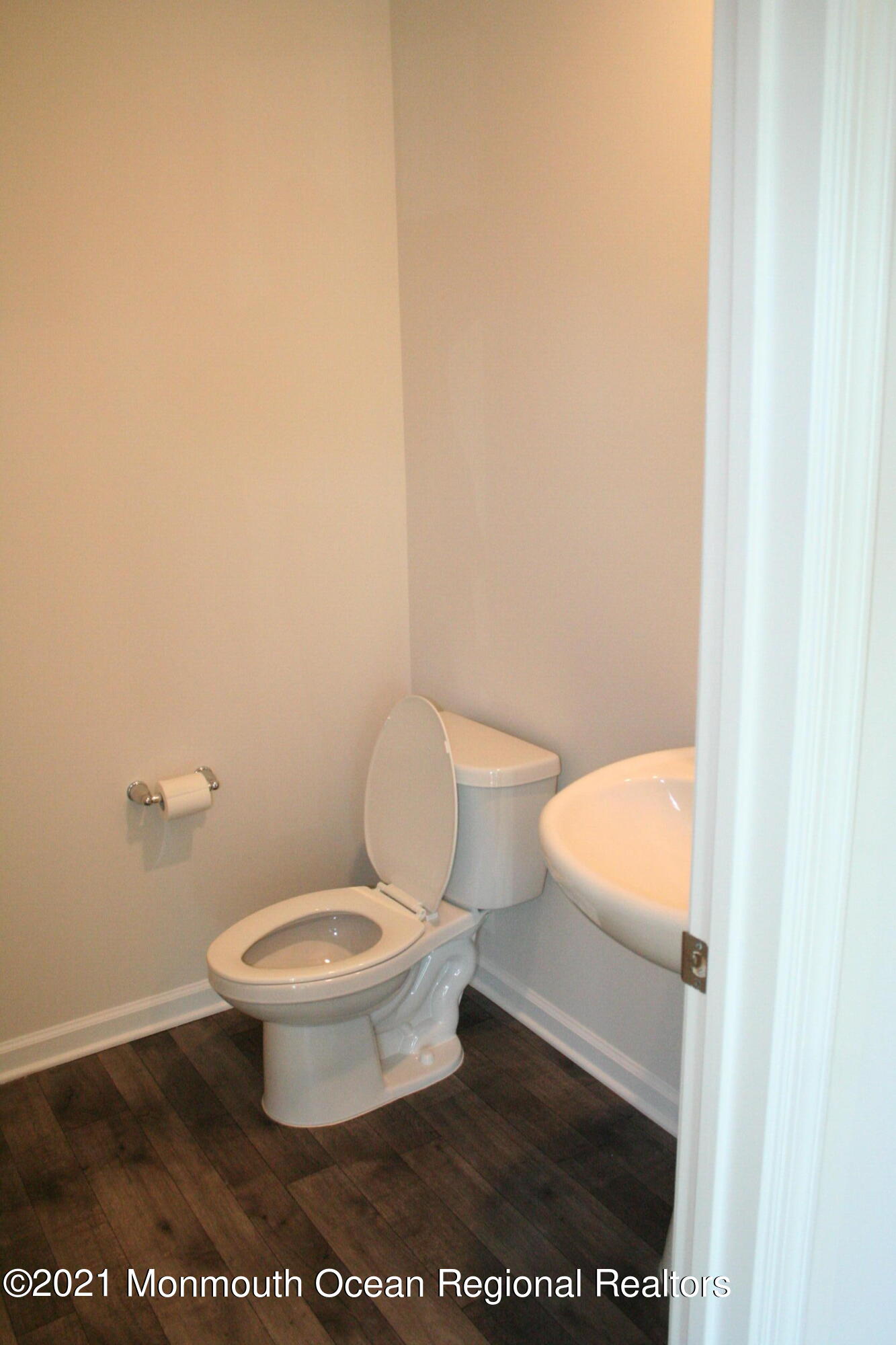 107 Cox Road Barnegat, NJ 08005 - Photo 11 of 44 a white toilet sitting next to a white wall