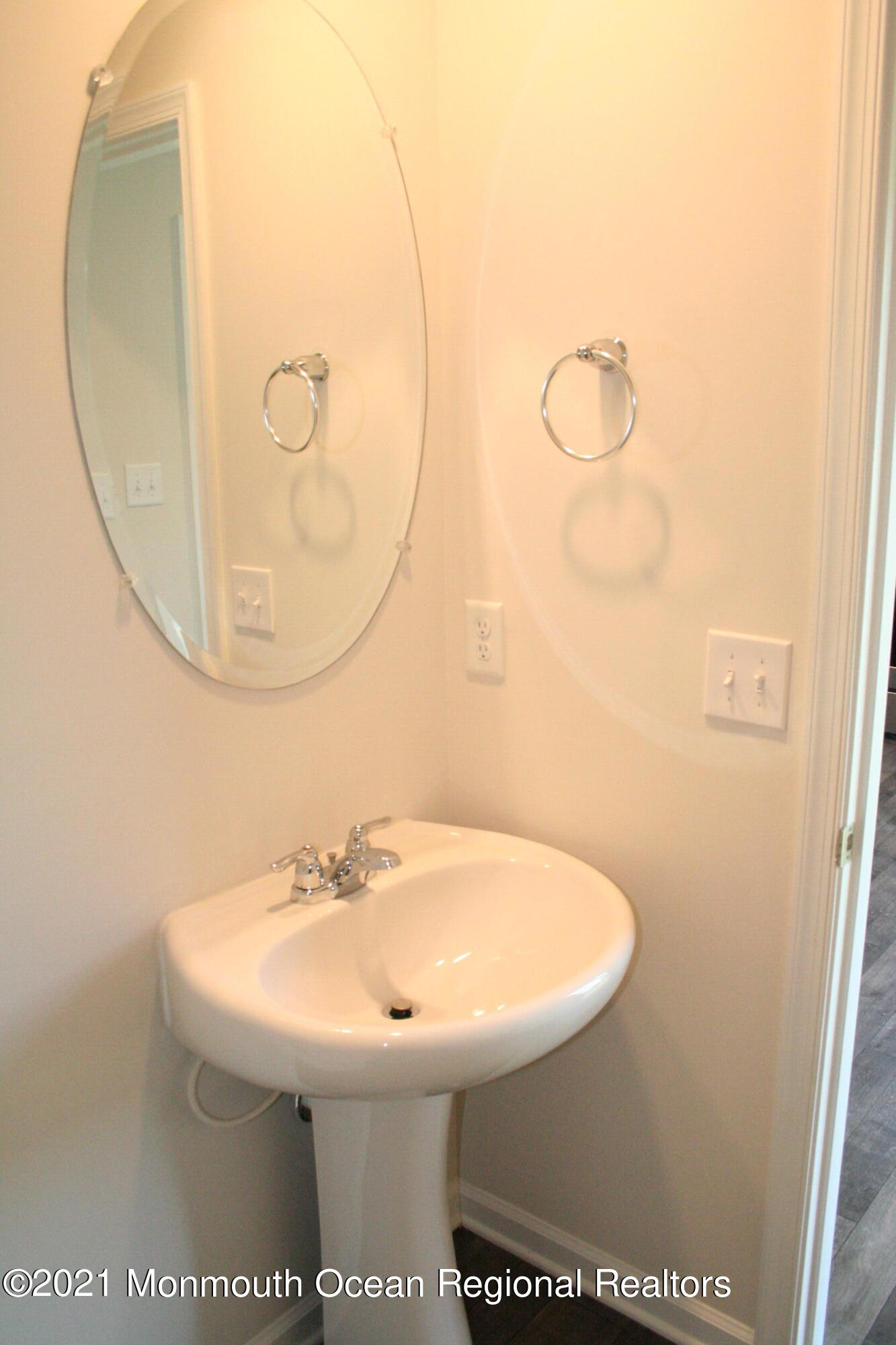 107 Cox Road Barnegat, NJ 08005 - Photo 12 of 44 a bathroom with a sink and mirror