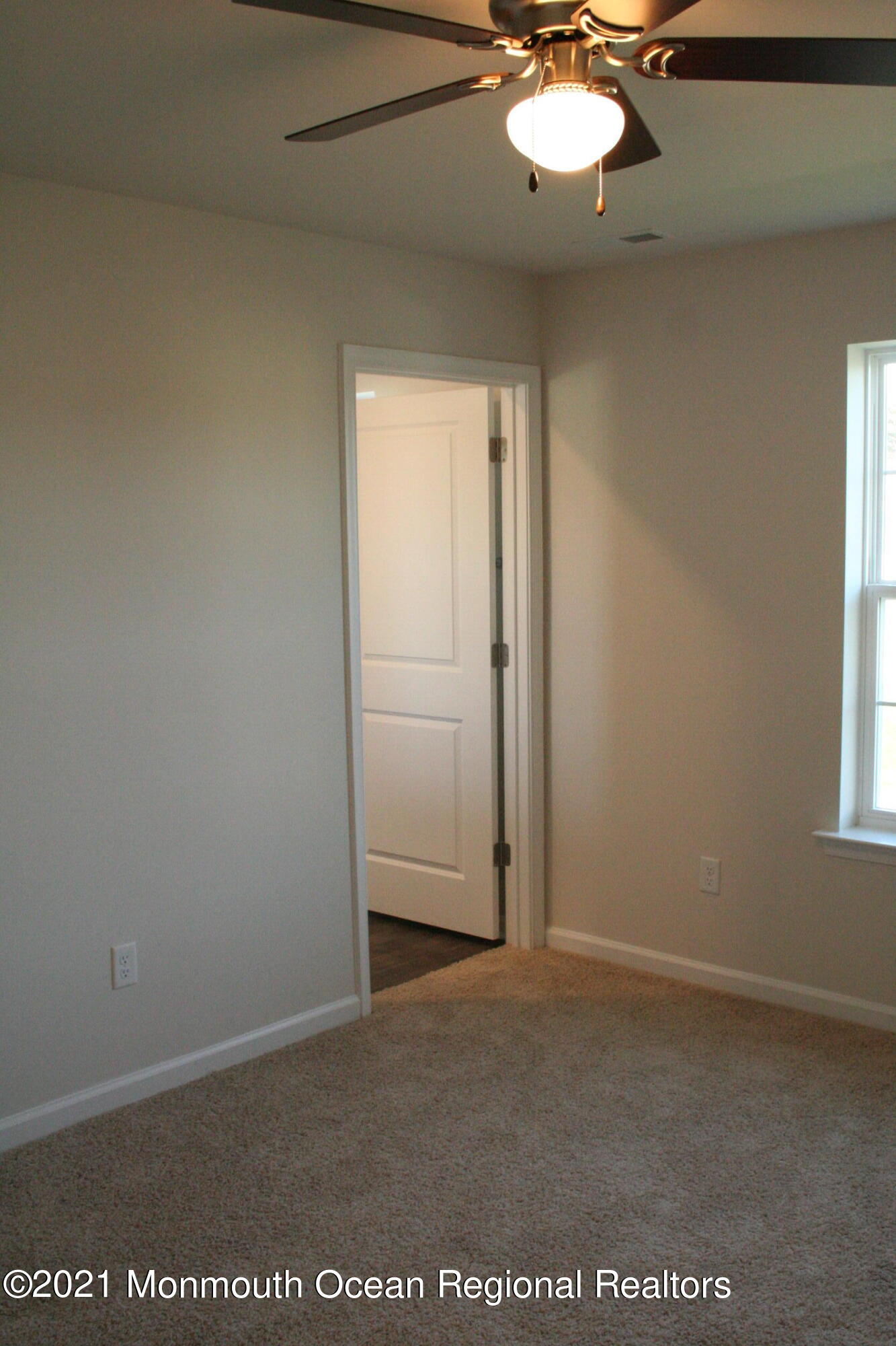 107 Cox Road Barnegat, NJ 08005 - Photo 16 of 44 an empty room with a window
