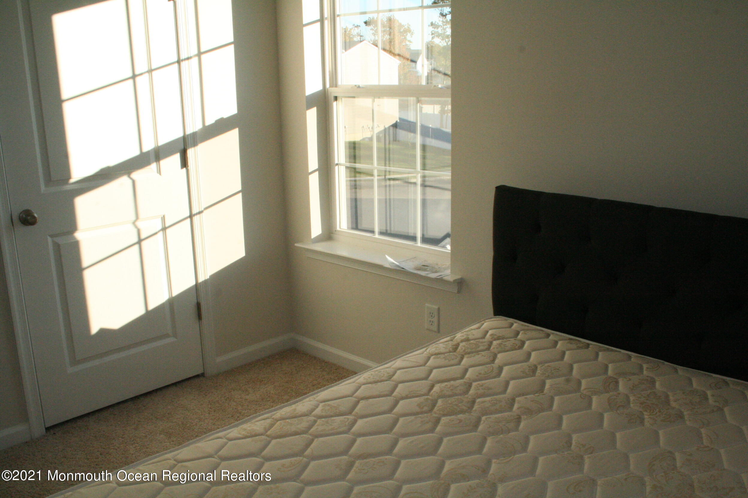 107 Cox Road Barnegat, NJ 08005 - Photo 20 of 44 a view of an empty room and window