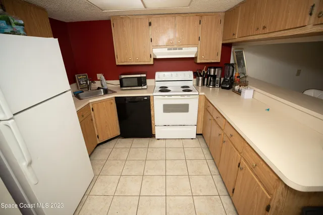 a bathroom with a sink mirror vanity and toilet