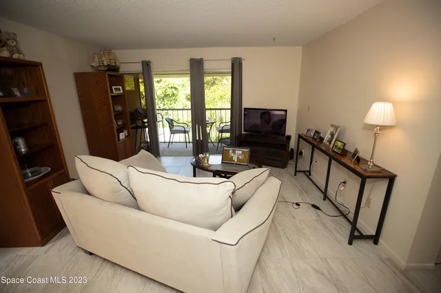 a kitchen with a stove top oven and cabinets