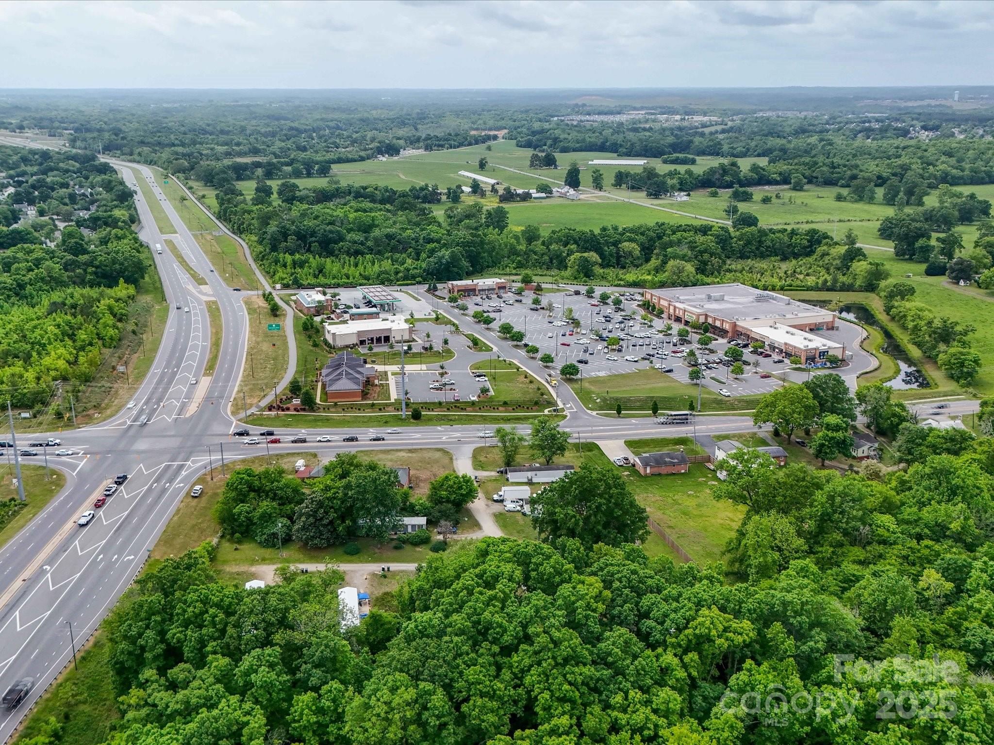 4940 Weddington Road Concord, NC 28027 - Photo 11 of 14 an aerial view of a house with a garden