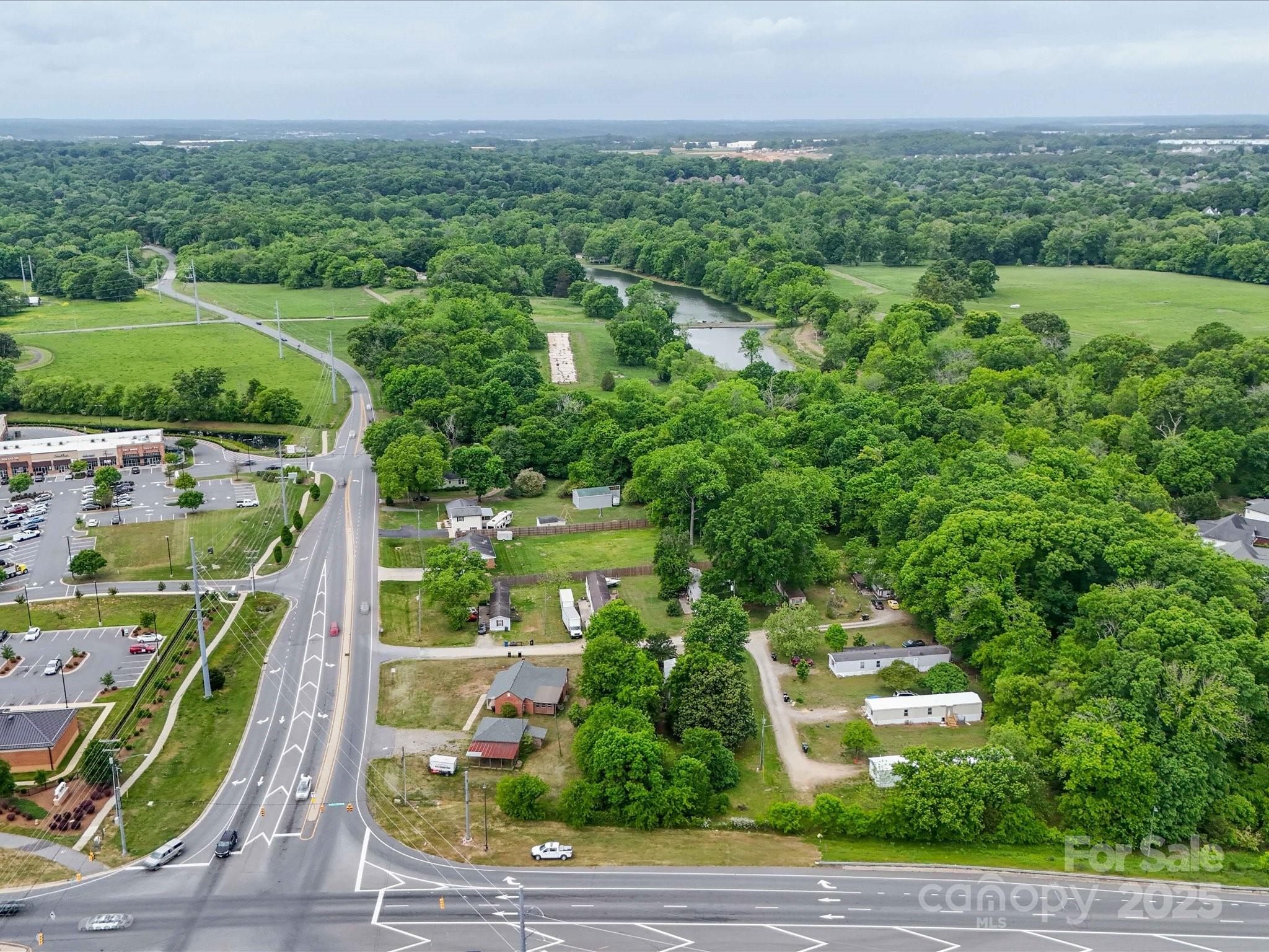 4940 Weddington Road Concord, NC 28027 - Photo 12 of 14 an aerial view of multiple house