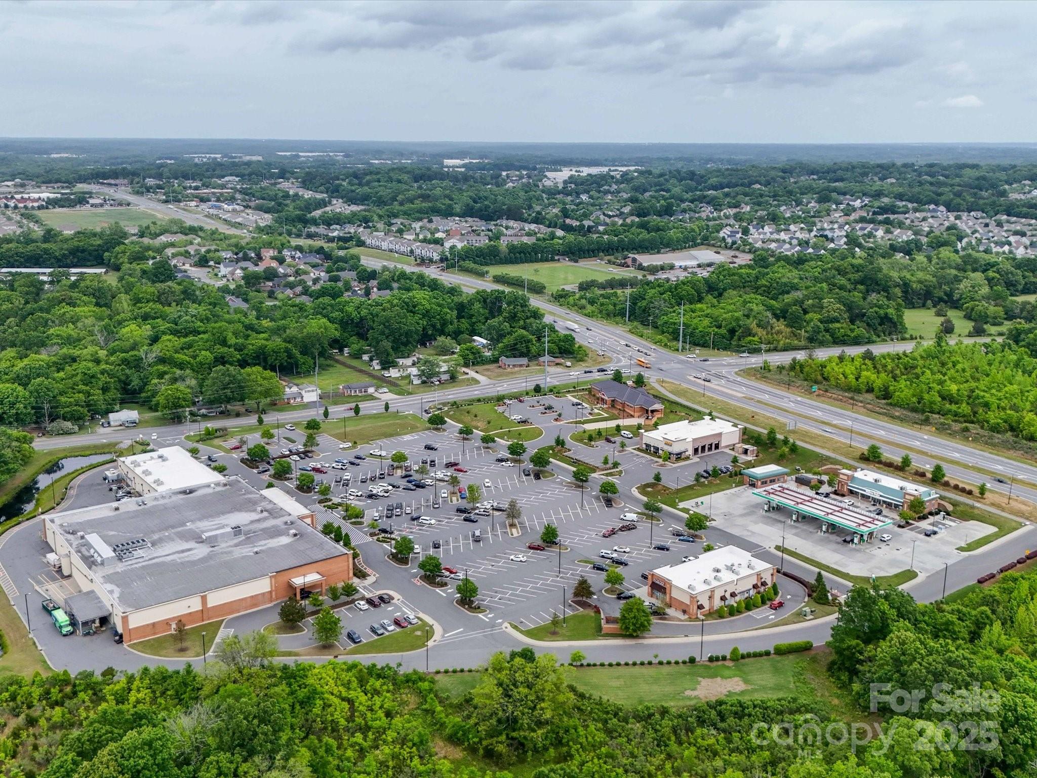 4940 Weddington Road Concord, NC 28027 - Photo 4 of 14 an aerial view of a residential houses with outdoor space