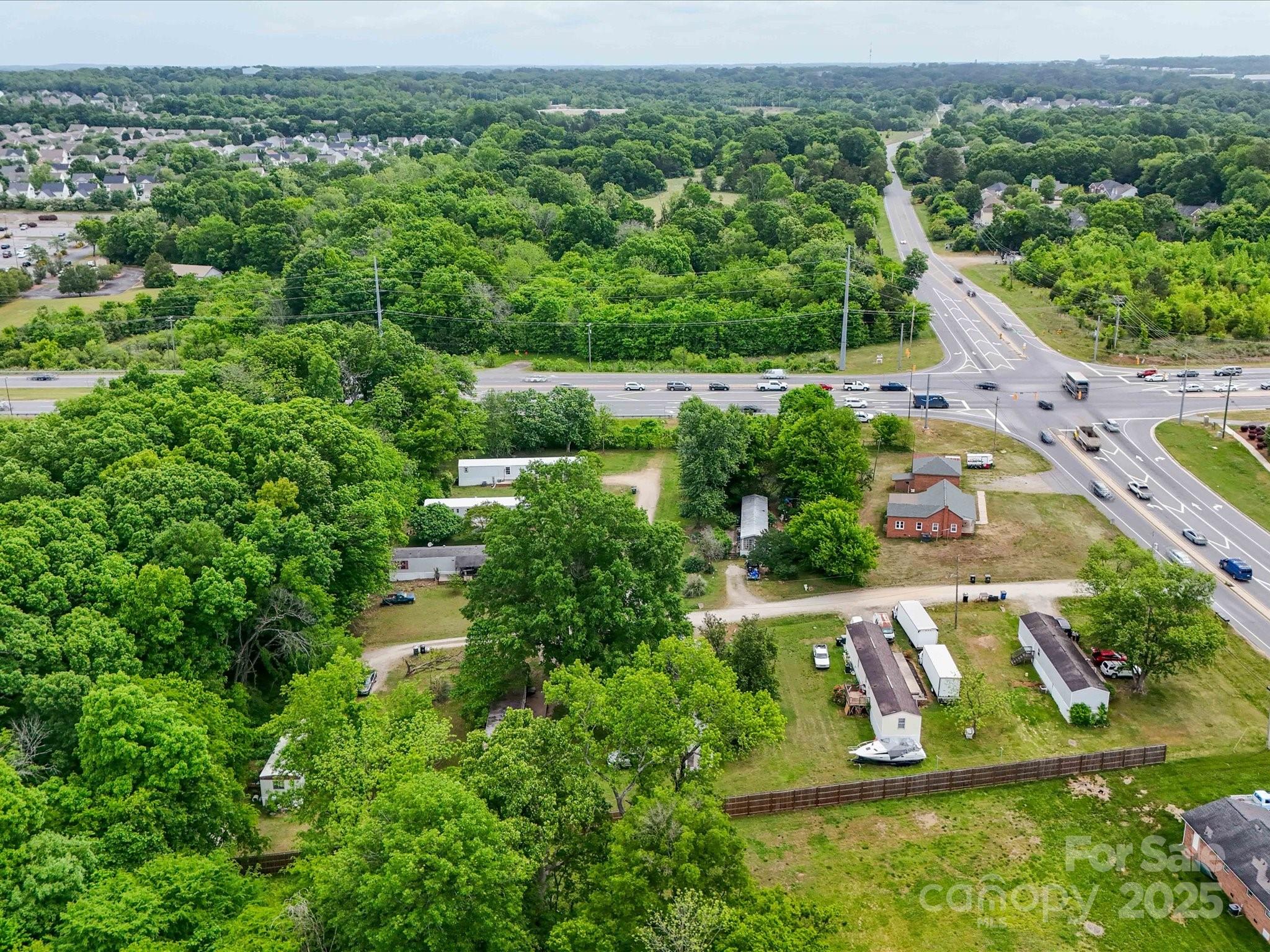 4940 Weddington Road Concord, NC 28027 - Photo 10 of 14 an aerial view of a house with a yard