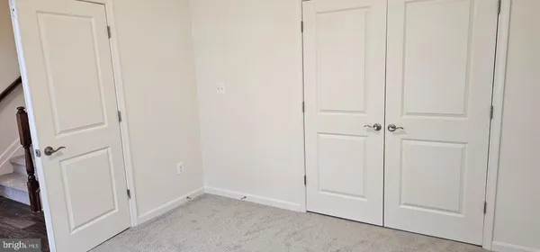 an empty room with a door
