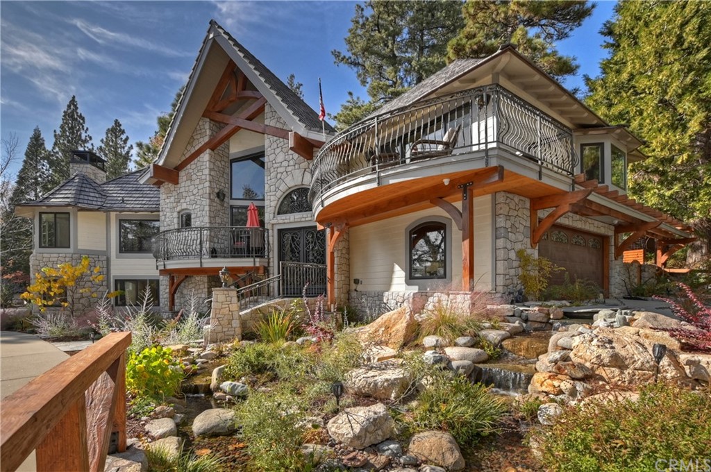 27880 Peninsula Drive North Lake Arrowhead, CA 92352 - Photo 64 of 69 a front view of a house with a yard