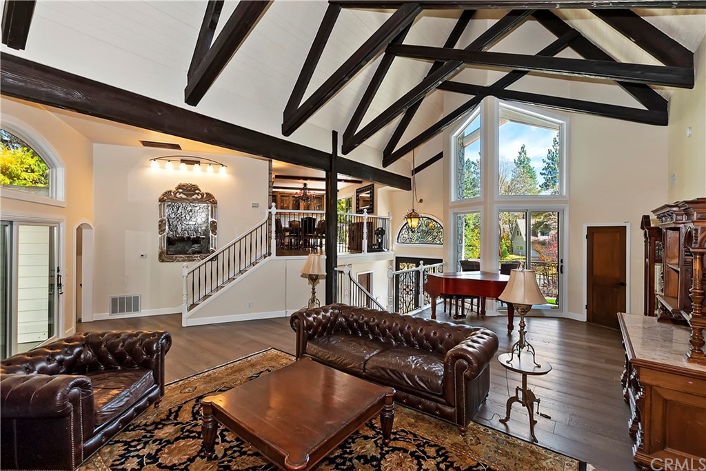 27880 Peninsula Drive North Lake Arrowhead, CA 92352 - Photo 8 of 69 a living room with furniture and a floor to ceiling window