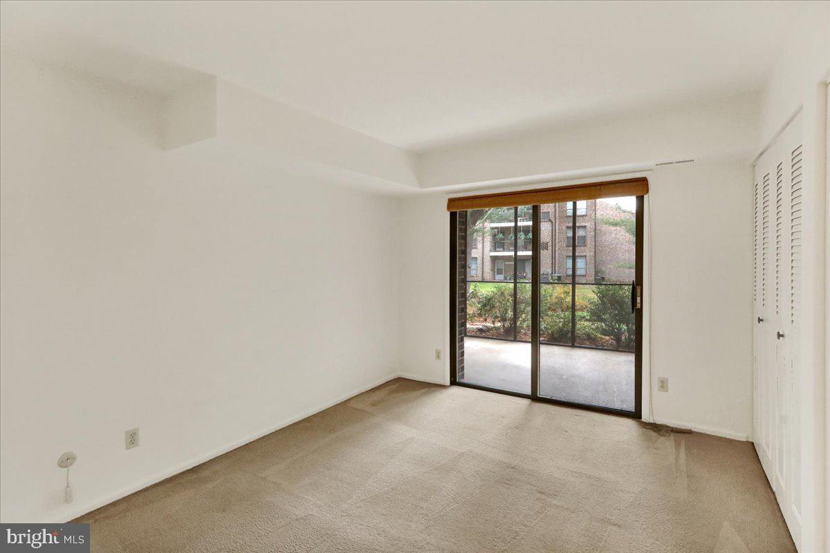 10 D Fairway Road Reading, PA 19607 - Photo 7 of 12 a view of an empty room with glass door