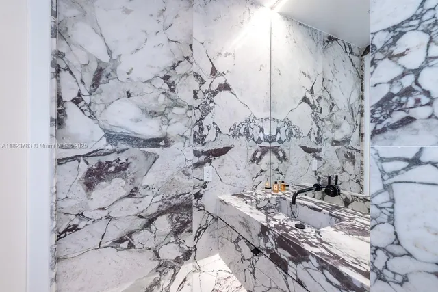 a view of a big room with wooden floor and a window