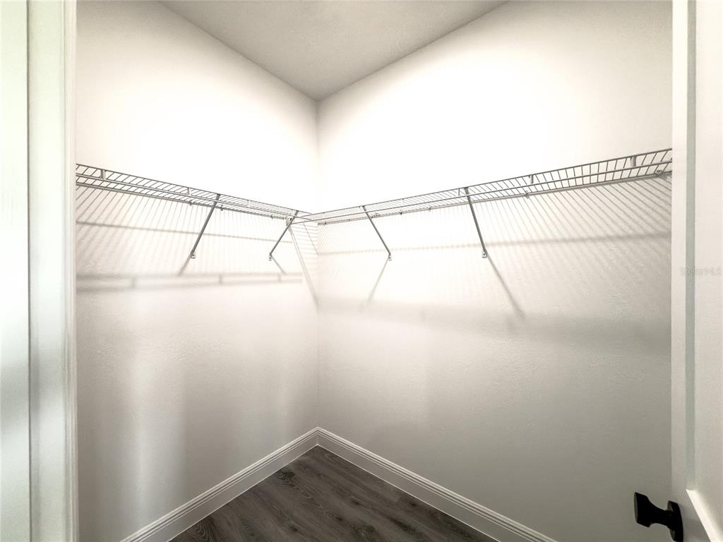 14481 Southwest 29th Terrace Ocala, FL 34473 - Photo 19 of 31 a view of a room with racks on the wall