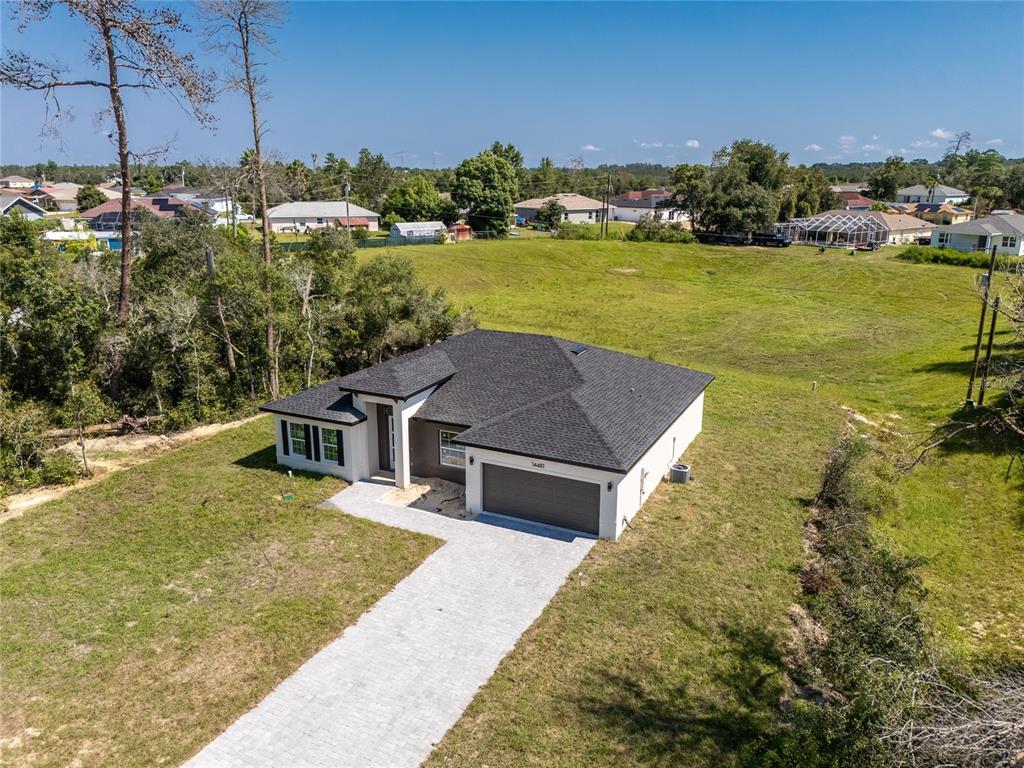14481 Southwest 29th Terrace Ocala, FL 34473 - Photo 2 of 31 a aerial view of a house with a ocean view