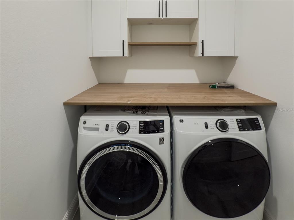 14481 Southwest 29th Terrace Ocala, FL 34473 - Photo 28 of 31 a close up view of washer and dryer