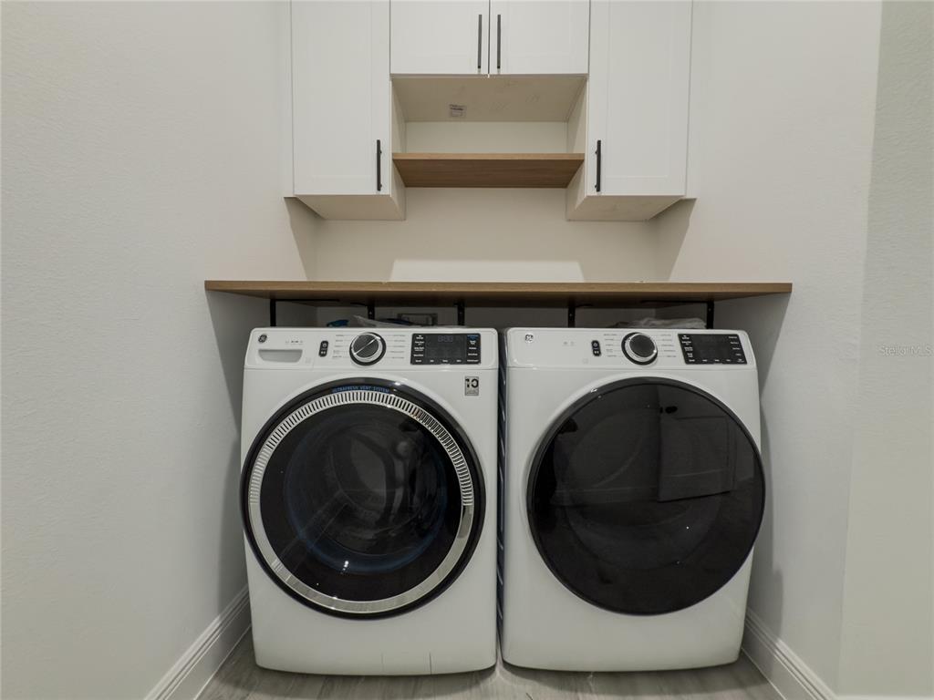 14481 Southwest 29th Terrace Ocala, FL 34473 - Photo 29 of 31 a utility room with dryer and washer