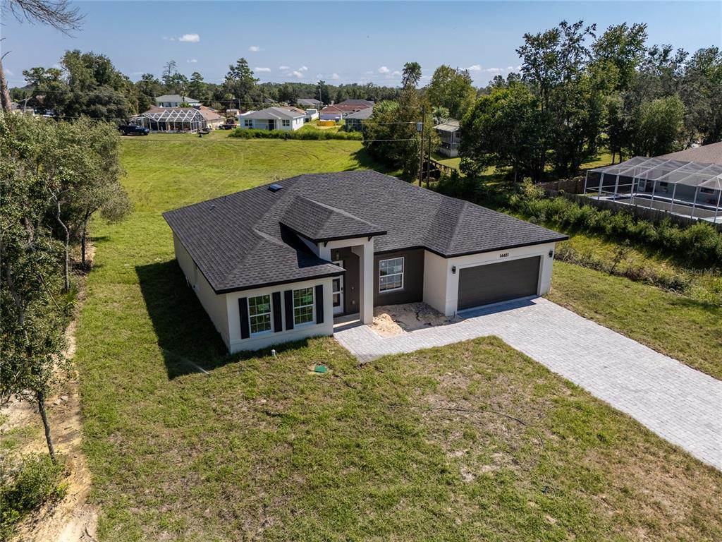 14481 Southwest 29th Terrace Ocala, FL 34473 - Photo 3 of 31 swimming pool view with lake view