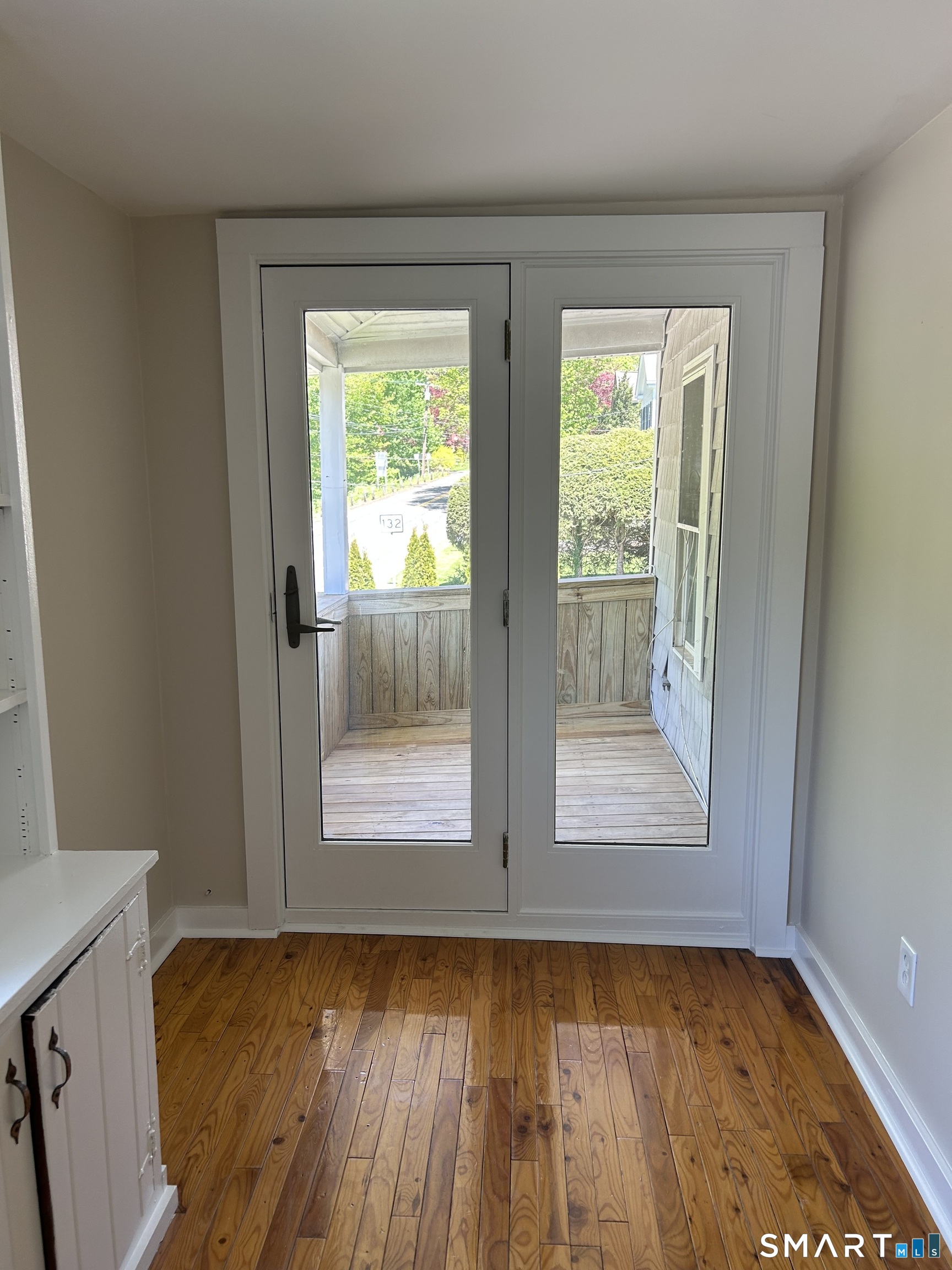 4 Weekeepeemee Road Woodbury, CT 06798 - Photo 11 of 22 a view of a room with wooden floor and windows
