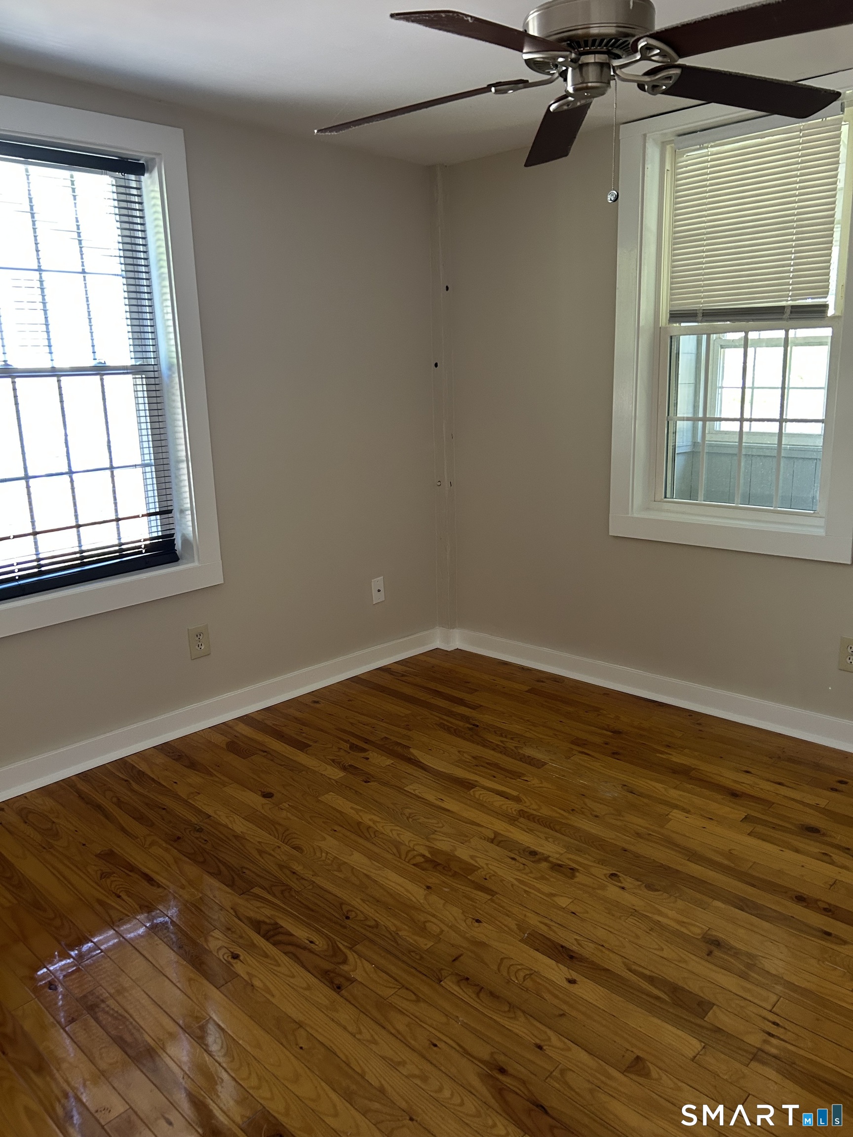 4 Weekeepeemee Road Woodbury, CT 06798 - Photo 15 of 22 a view of a room with wooden floor and windows