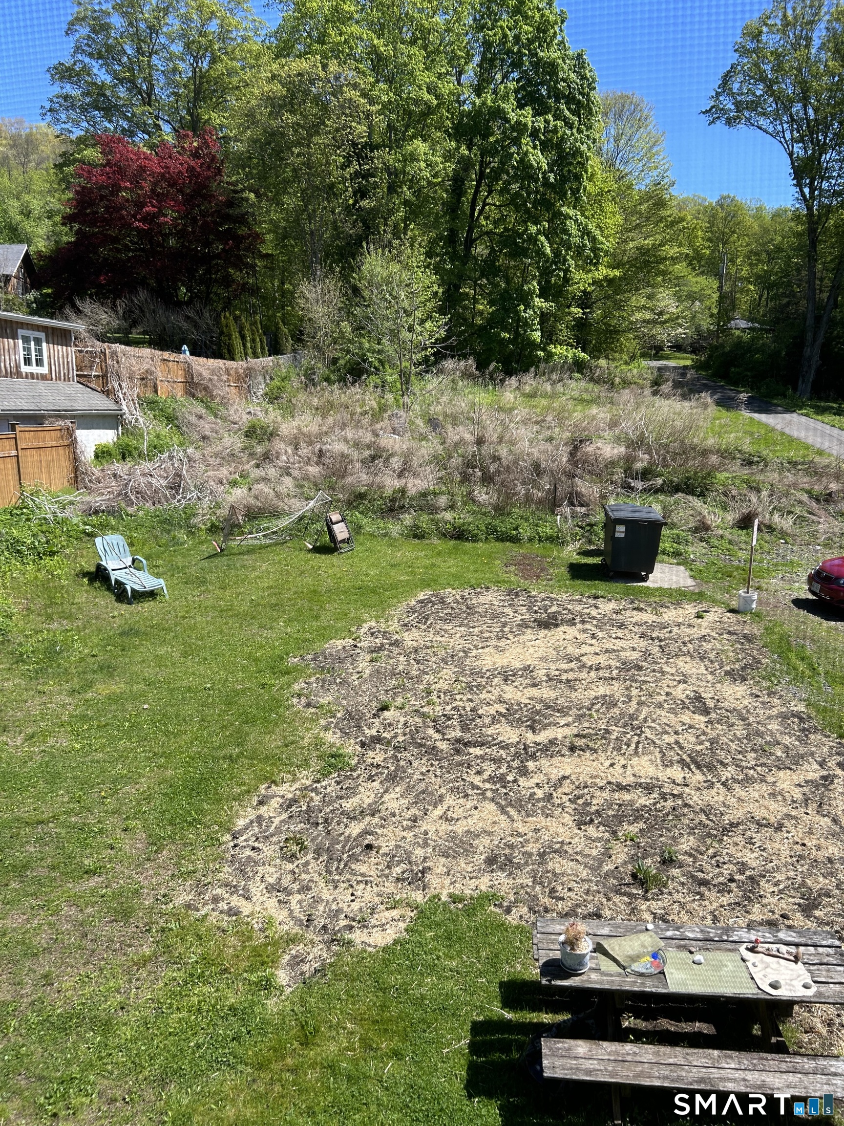 4 Weekeepeemee Road Woodbury, CT 06798 - Photo 22 of 22 a view of a yard with an outdoor space