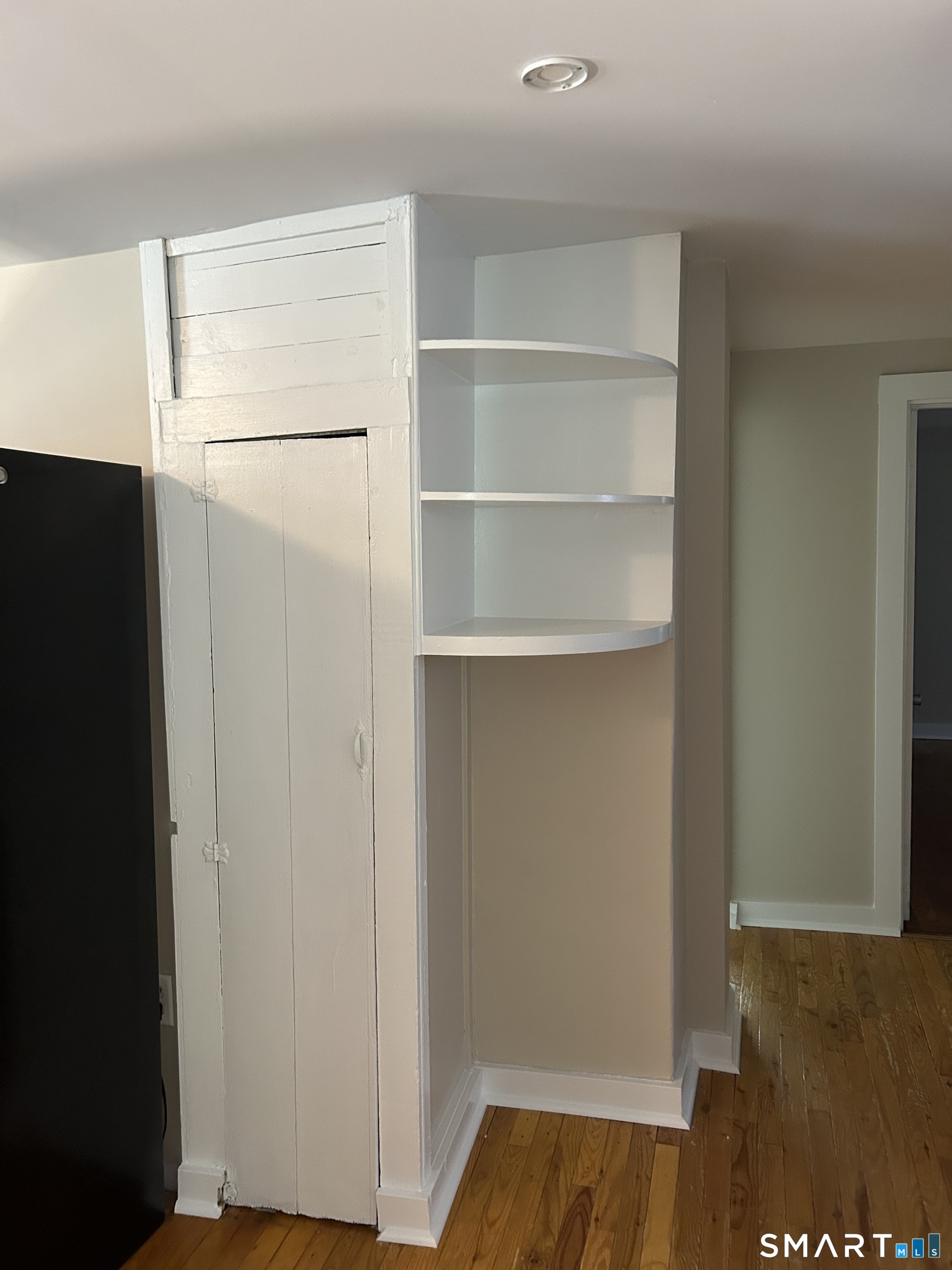 4 Weekeepeemee Road Woodbury, CT 06798 - Photo 5 of 22 a view of walk in closet with empty racks
