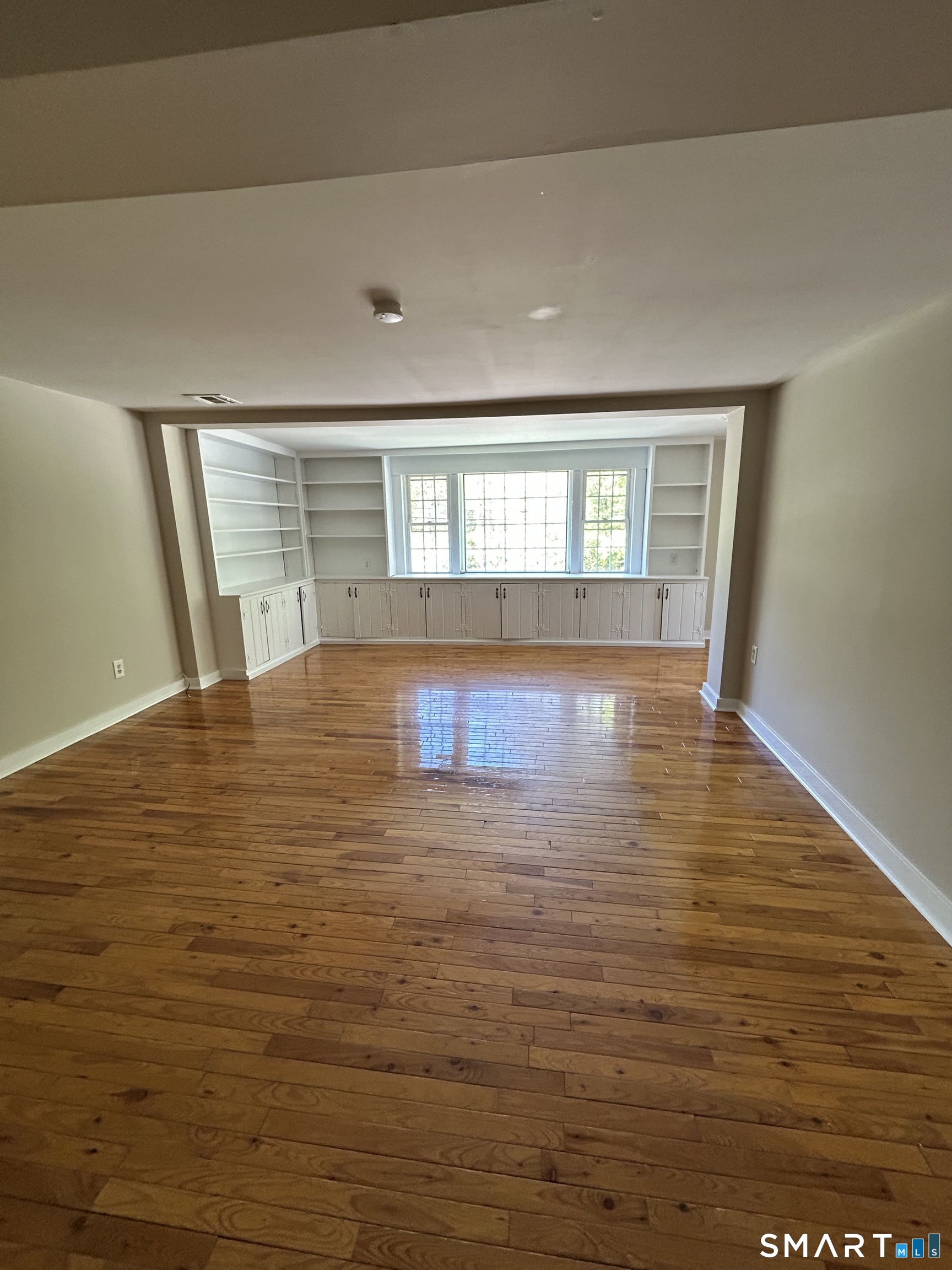 4 Weekeepeemee Road Woodbury, CT 06798 - Photo 9 of 22 a view of an empty room and window