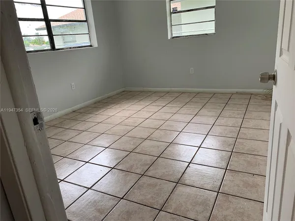 a view of a utility room and window