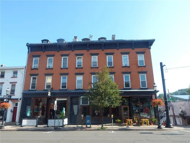 a front view of a building and a street