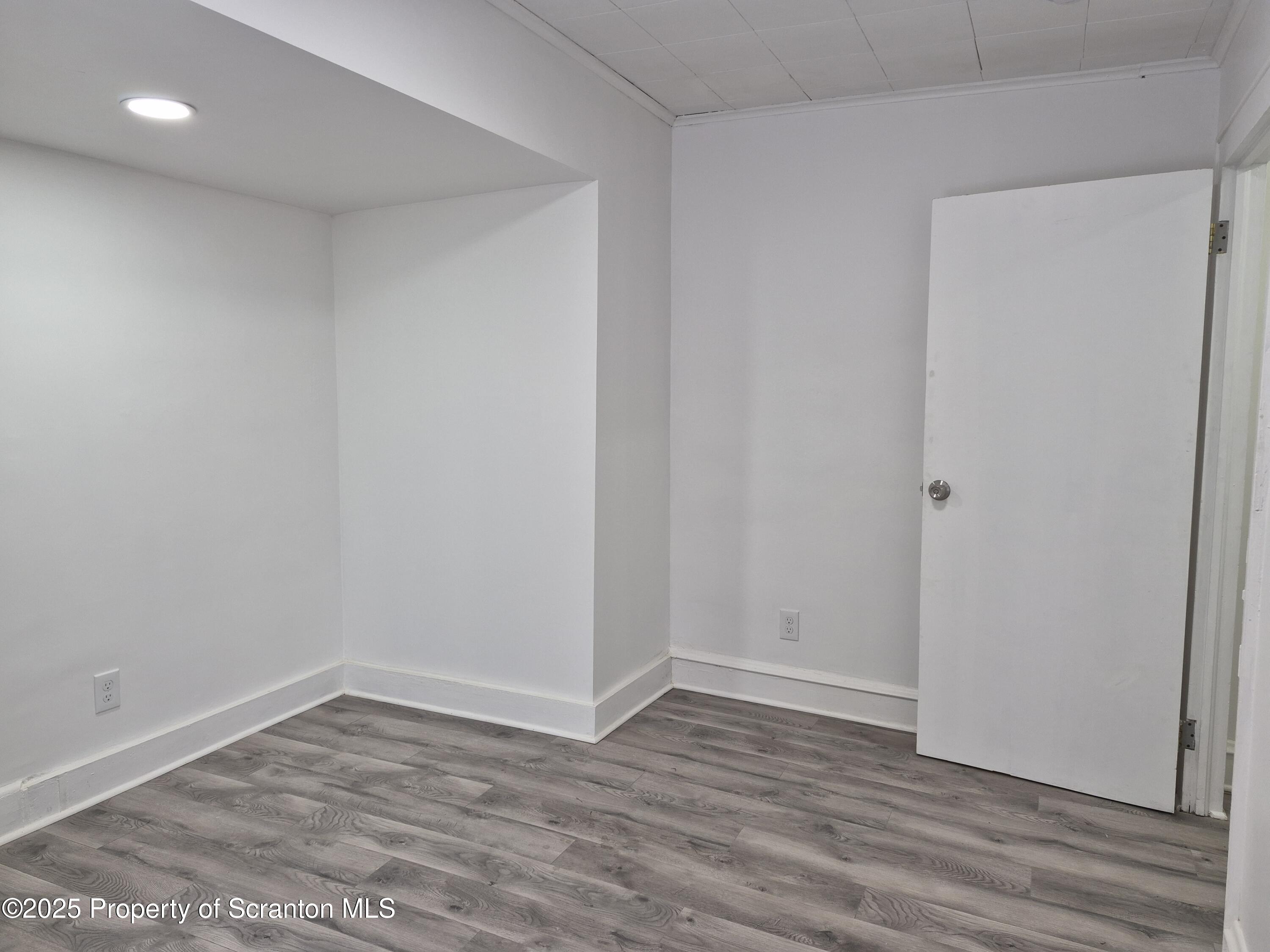 1758 Wayne Avenue Scranton, PA 18508 - Photo 14 of 20 a view of empty room with wooden floor