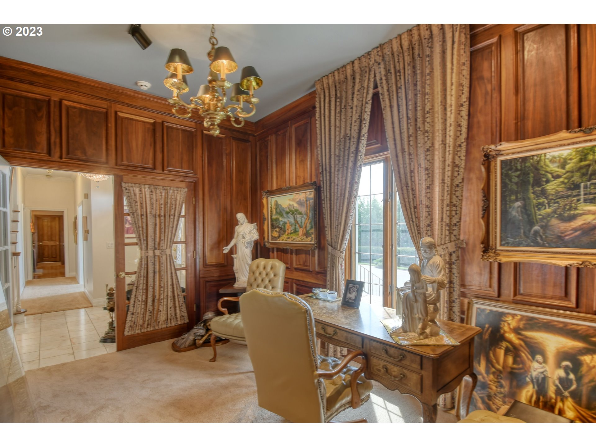 1092 Skyline Drive Pendleton, OR 97801 - Photo 28 of 47 a living room with furniture a chandelier and a window