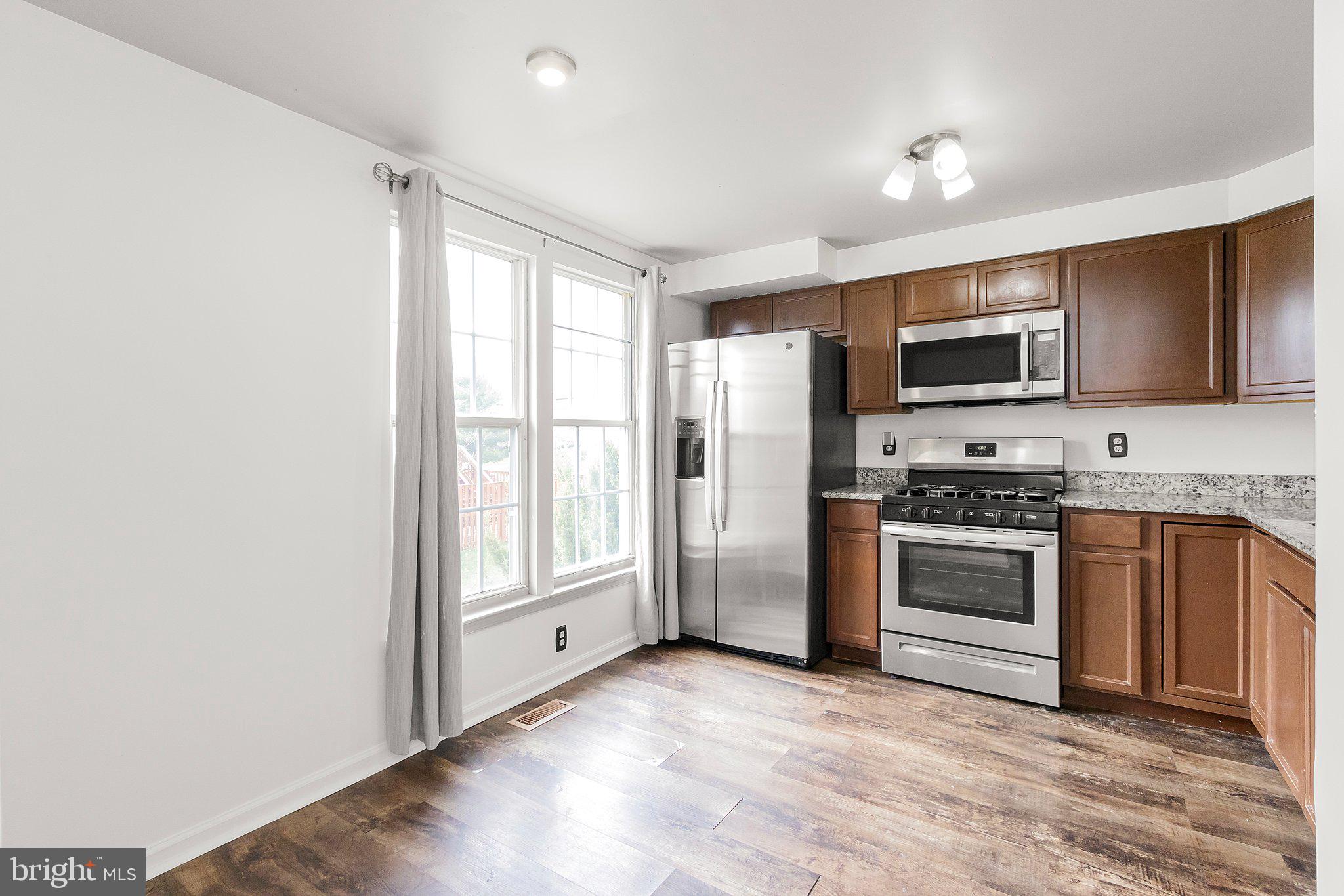 45310 Gable Square Sterling, VA 20164 - Photo 6 of 46 Modern kitchen with natural light.