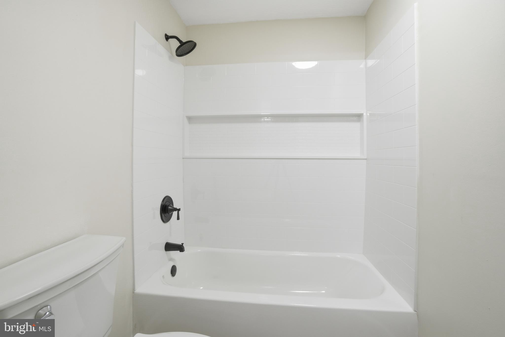 7 Riverview Place Willingboro, NJ 08046 - Photo 20 of 25 a close up of a bathtub in a bathroom