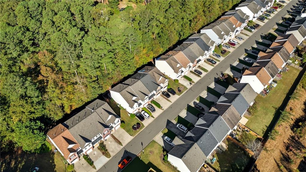 2913 Greyhawk Lane Cumming, GA 30040 - Photo 35 of 44 an aerial view of a house with a yard
