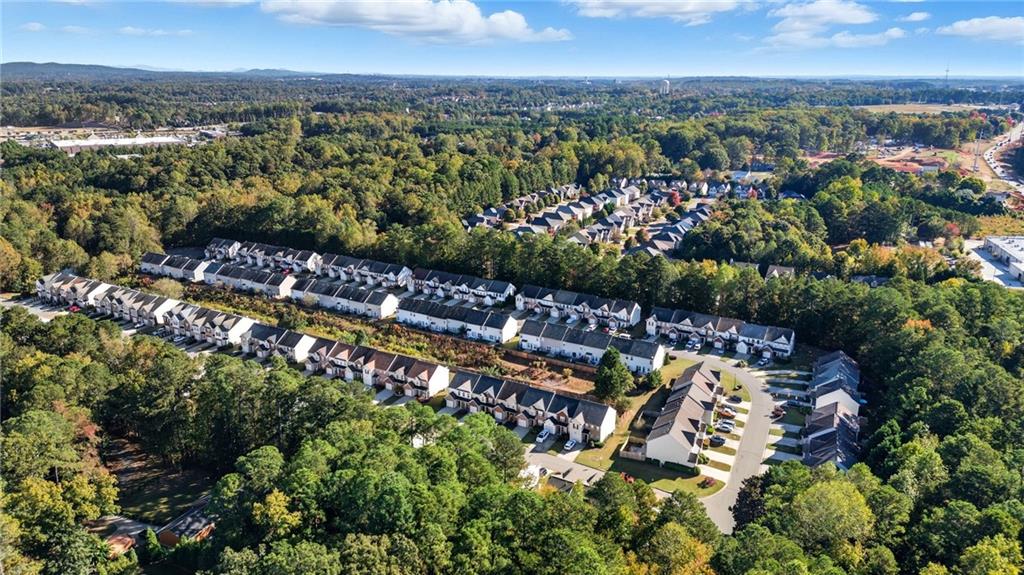 2913 Greyhawk Lane Cumming, GA 30040 - Photo 37 of 44 an aerial view of a city with lots of residential buildings