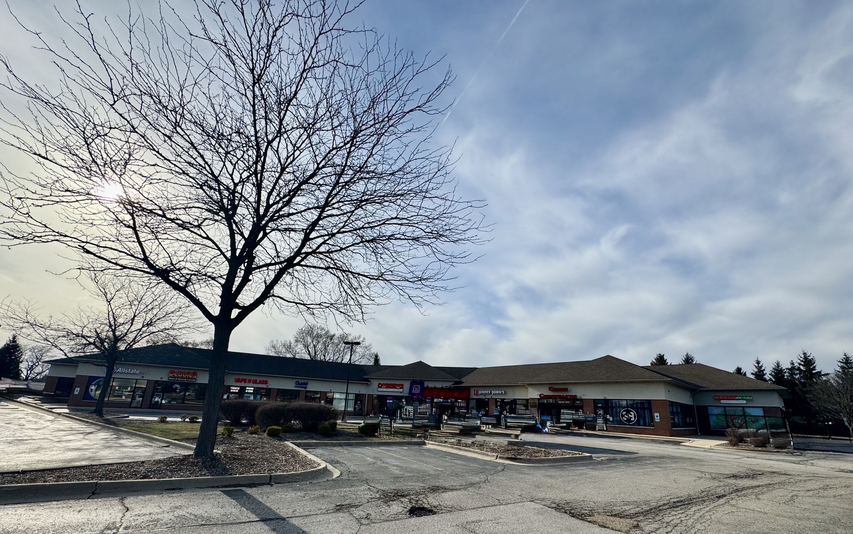 4579-81 State Route 71 Oswego, IL 60543 - Photo 3 of 11 a car parked in front of a building