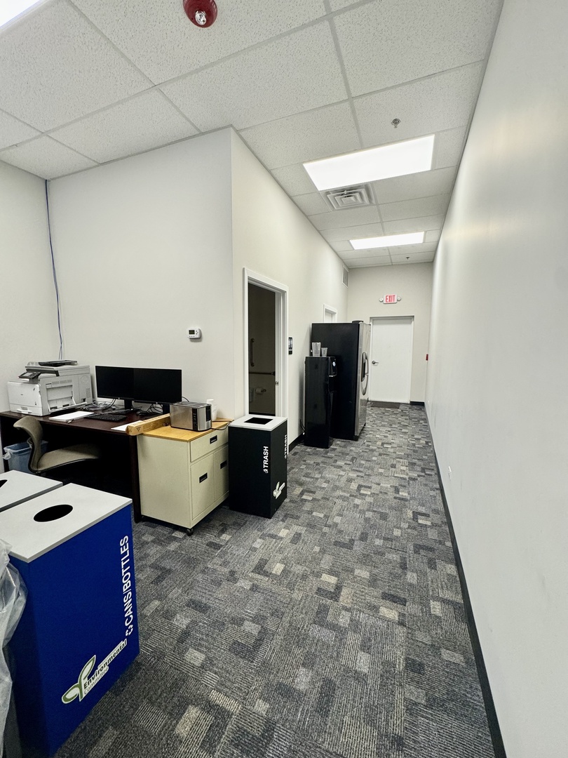4579-81 State Route 71 Oswego, IL 60543 - Photo 7 of 11 a kitchen with a stove and a refrigerator