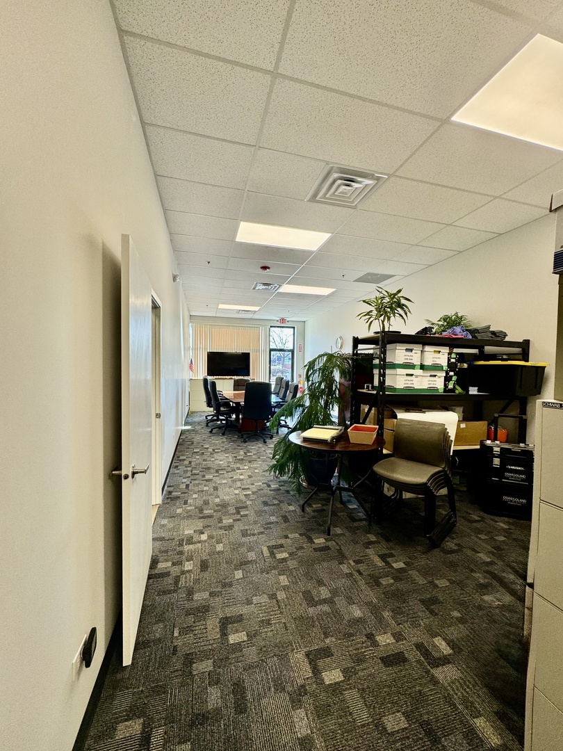 4579-81 State Route 71 Oswego, IL 60543 - Photo 8 of 11 a living room with furniture and a fireplace