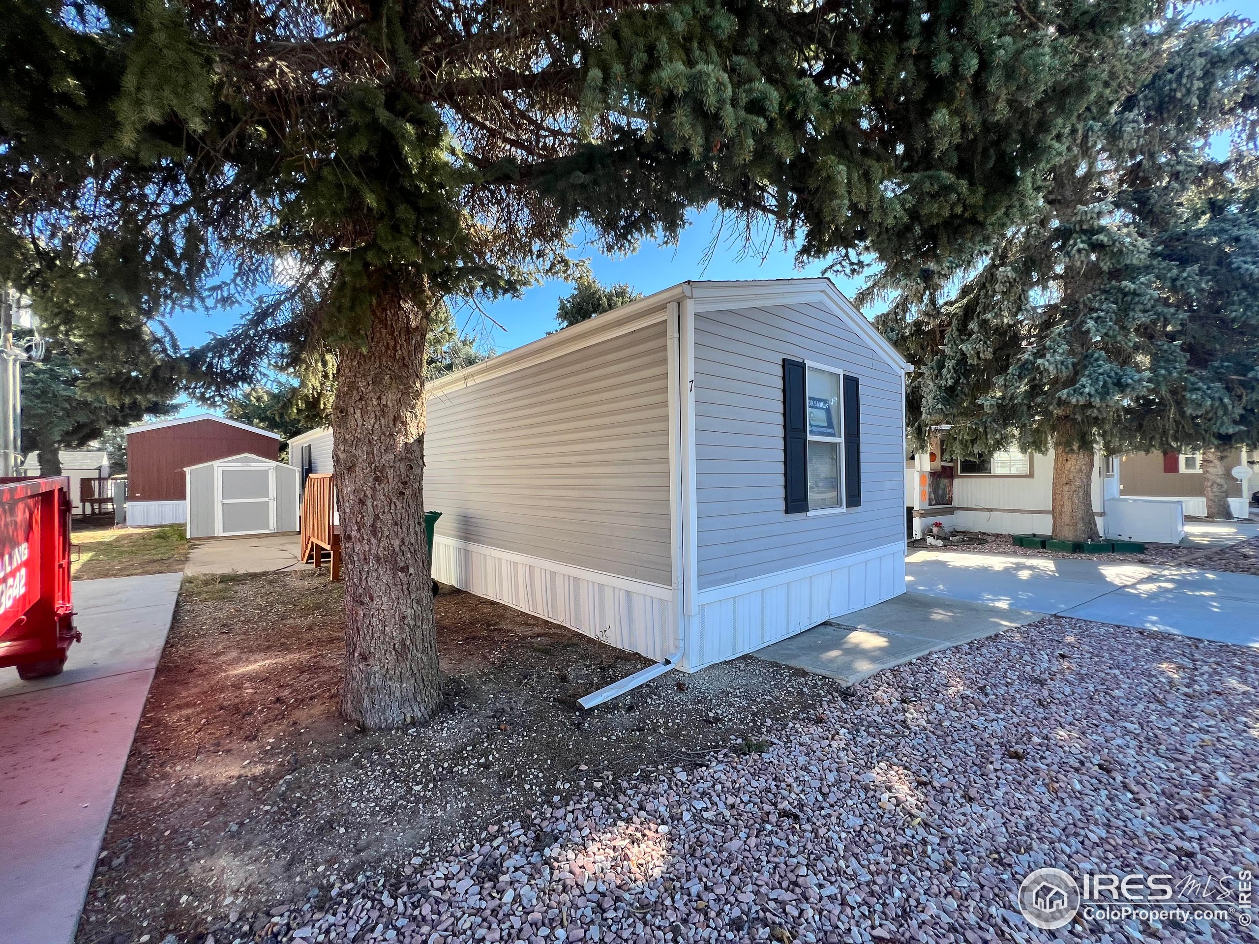 230 North 2nd Street, Unit 7 Berthoud, CO 80513 - Photo 3 of 14 a view of a house with a yard