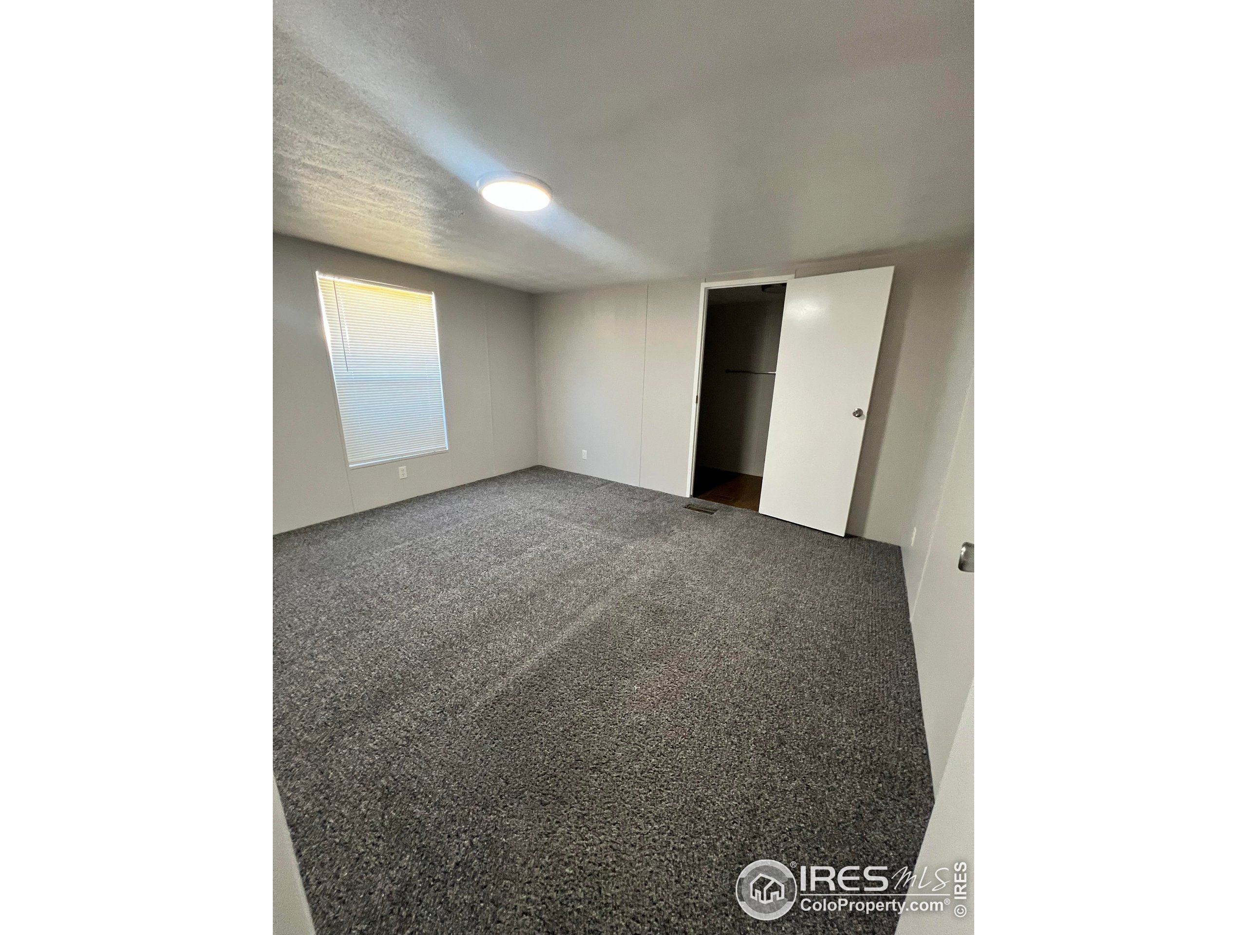 230 North 2nd Street, Unit 7 Berthoud, CO 80513 - Photo 8 of 14 a view of an empty room