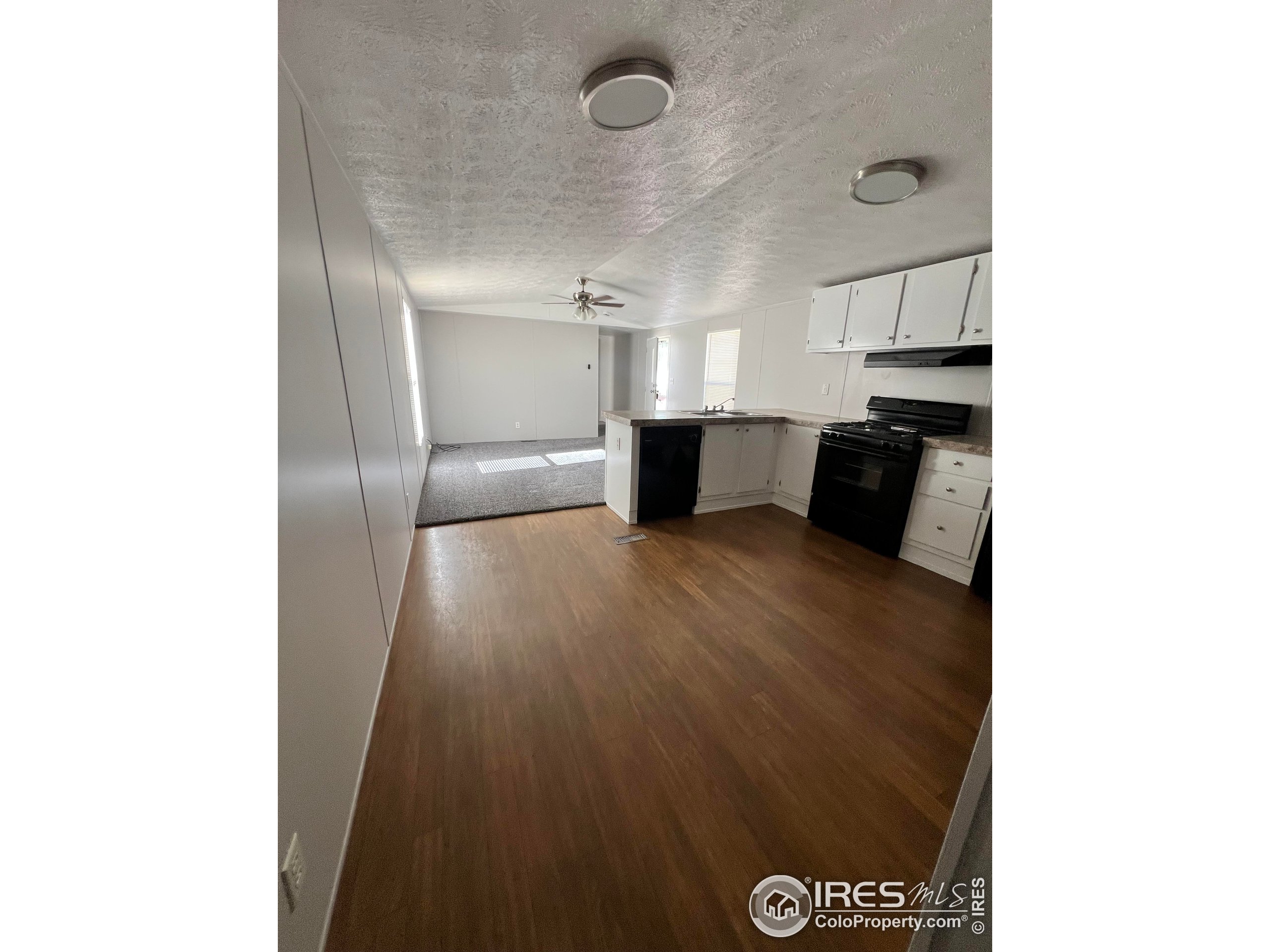 230 North 2nd Street, Unit 7 Berthoud, CO 80513 - Photo 10 of 14 a view of workspace with wooden floor
