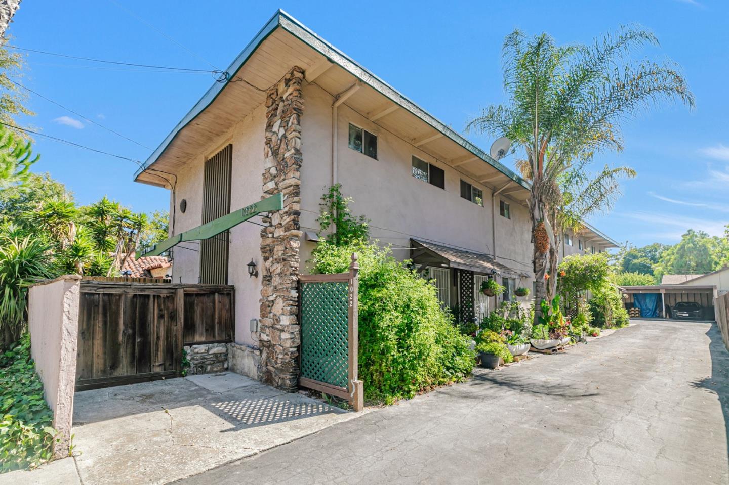 1022 Vermont Street San Jose, CA 95126 - Photo 4 of 23 a front view of a house with a garden
