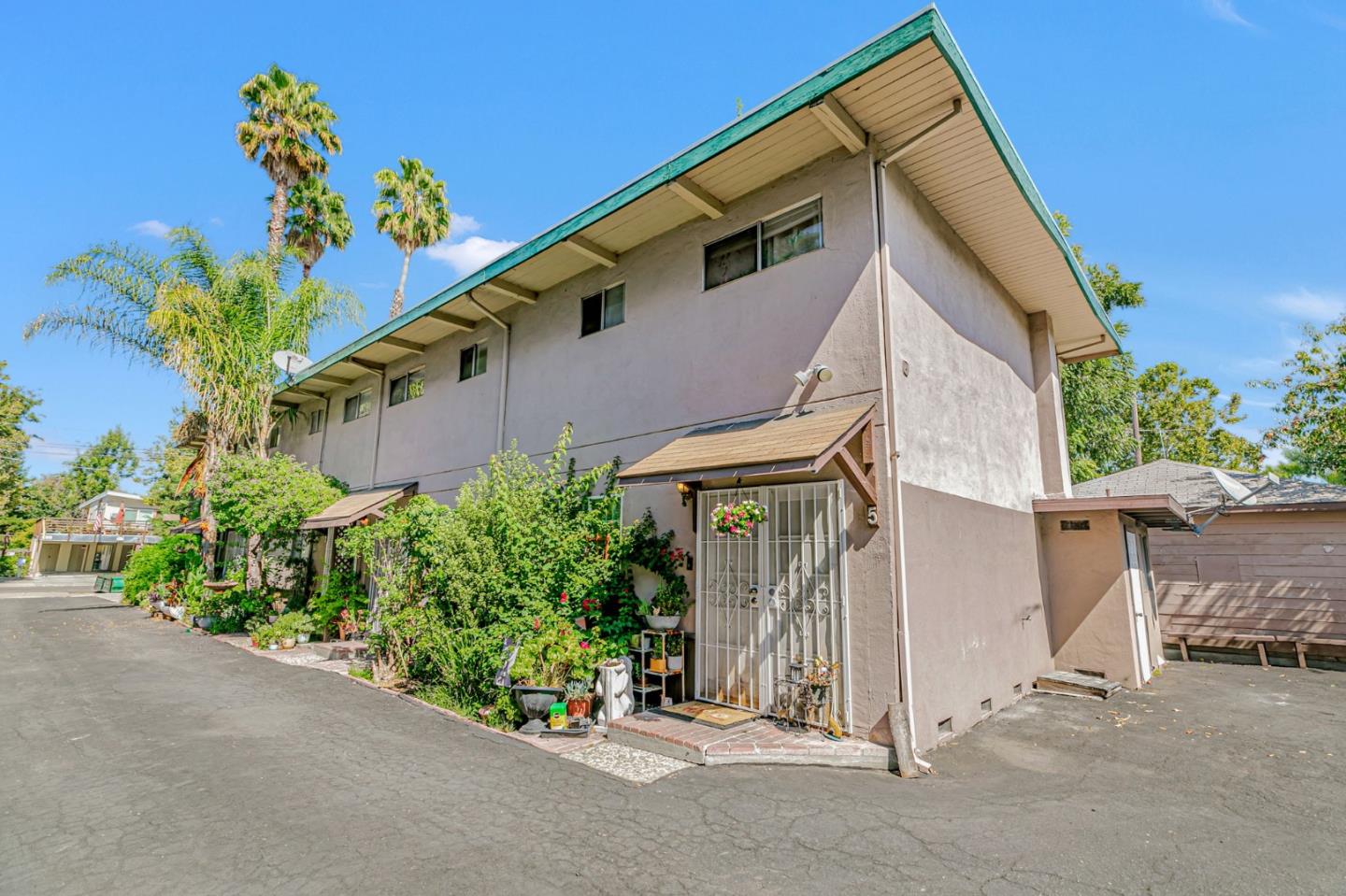 1022 Vermont Street San Jose, CA 95126 - Photo 6 of 23 a view of a house with a flower garden