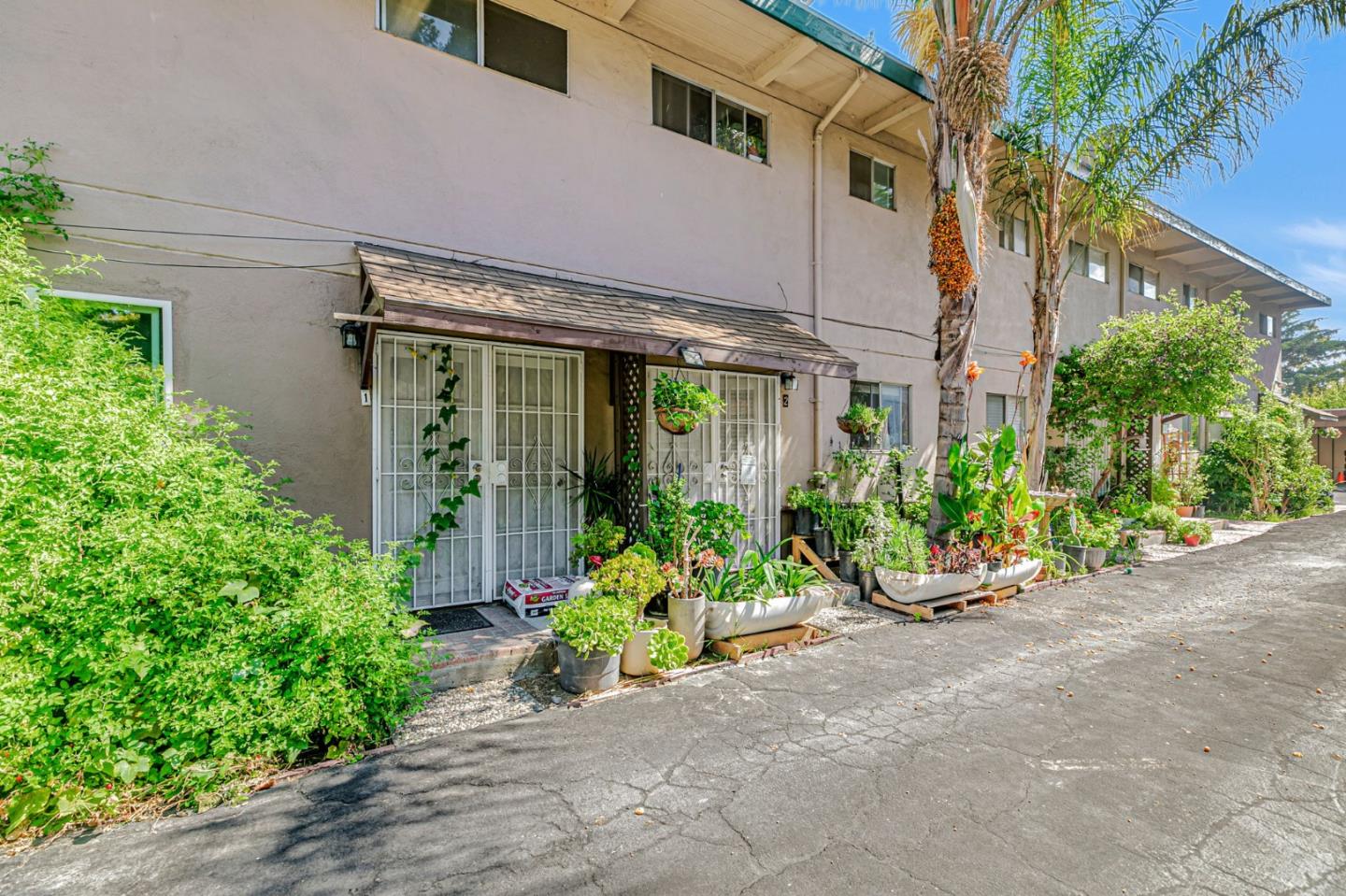 1022 Vermont Street San Jose, CA 95126 - Photo 7 of 23 a front view of a house with a yard