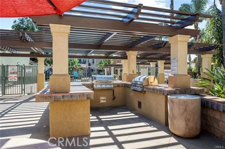 3603 Jetty Carlsbad, CA 92010 - Photo 43 of 43 a kitchen with a table and chairs