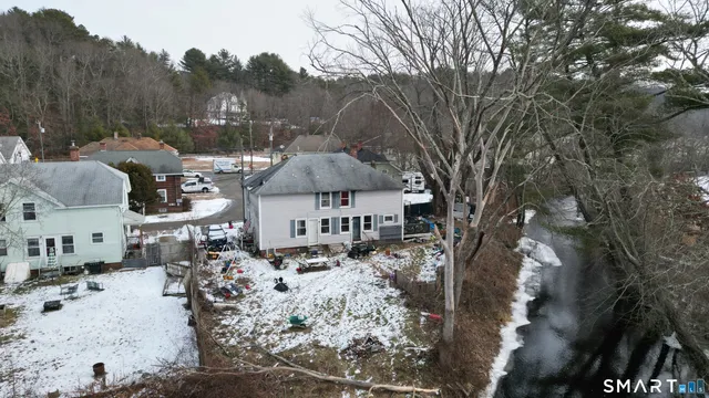 a house with trees in the background