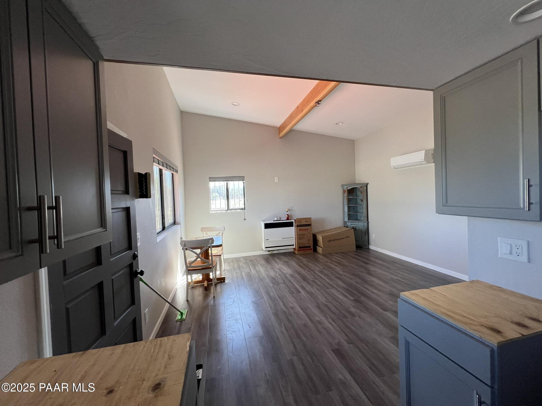 9188 Gleed Station Road Ash Fork, AZ 86320 - Photo 15 of 21 a living room with furniture and a wooden floor