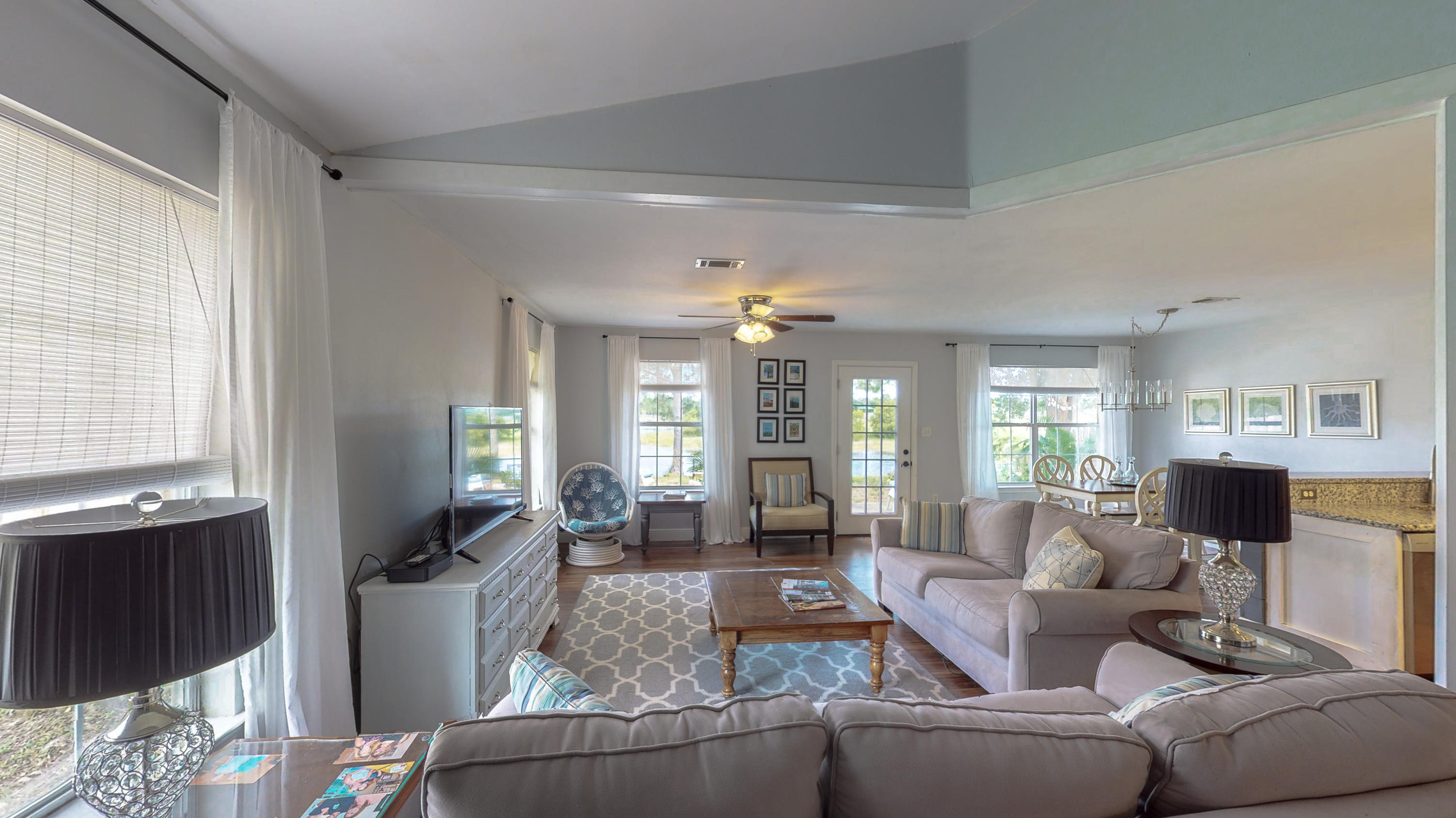 71 South Harborview Road Santa Rosa Beach, FL 32459 - Photo 15 of 38 a living room with furniture and a large window